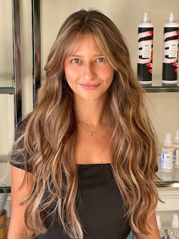 Lived-in balayage with soft bangs